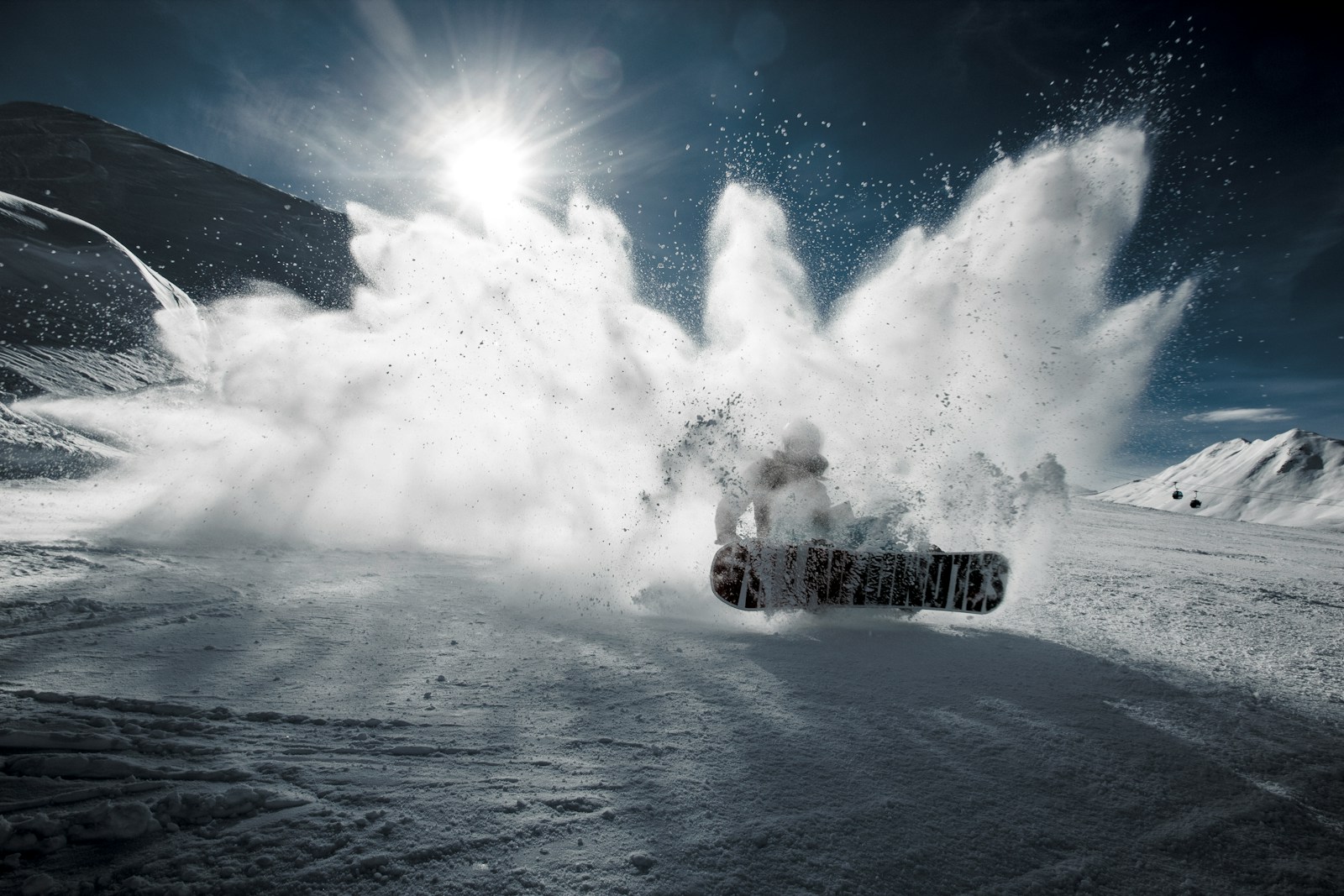 Photo by Mattias Olsson person snowboarding on mountain during daytime